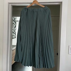 Green pleated midi skirt